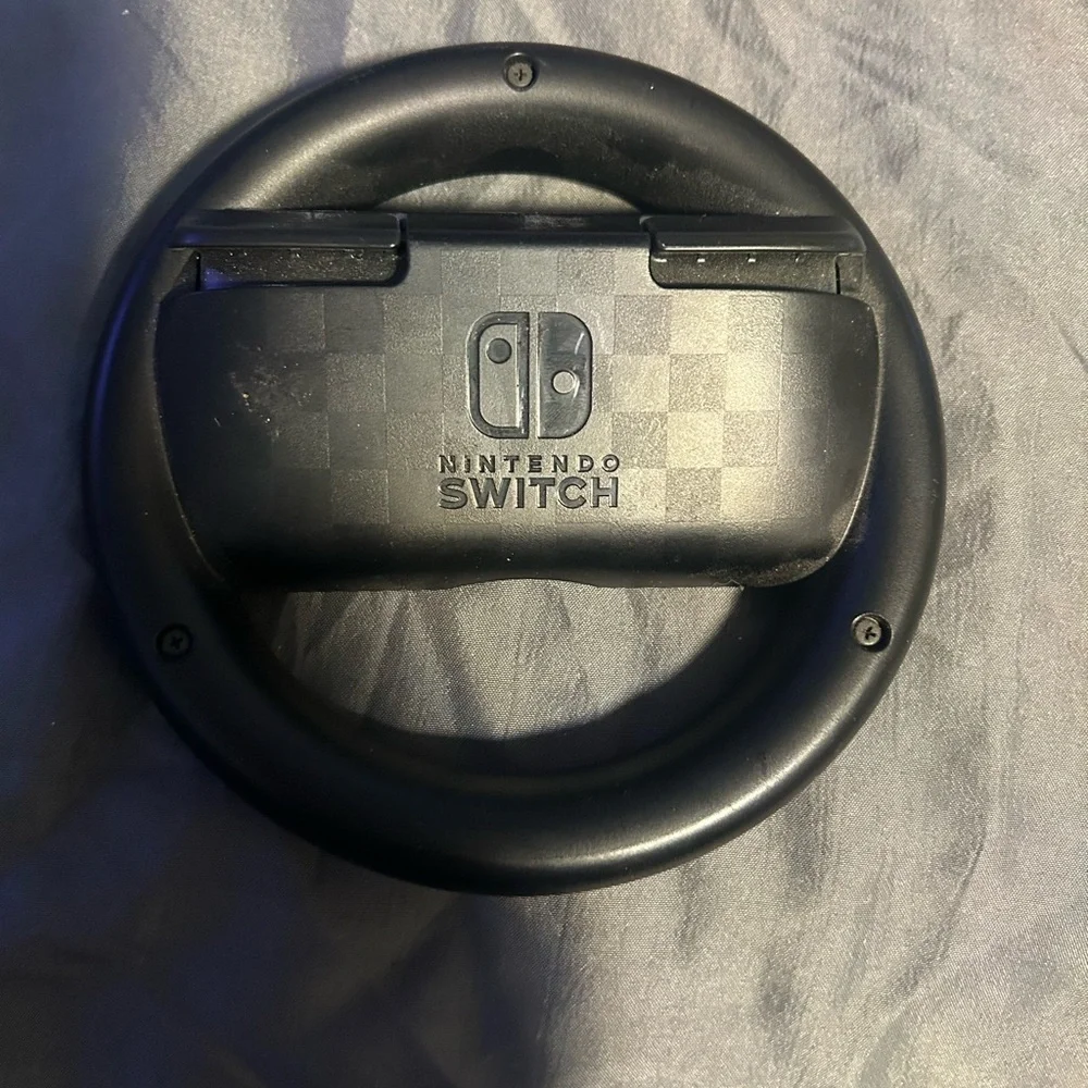 Nintendo Switch with gray Dock, Blue Kirby Case and Sonic Controller Accents,